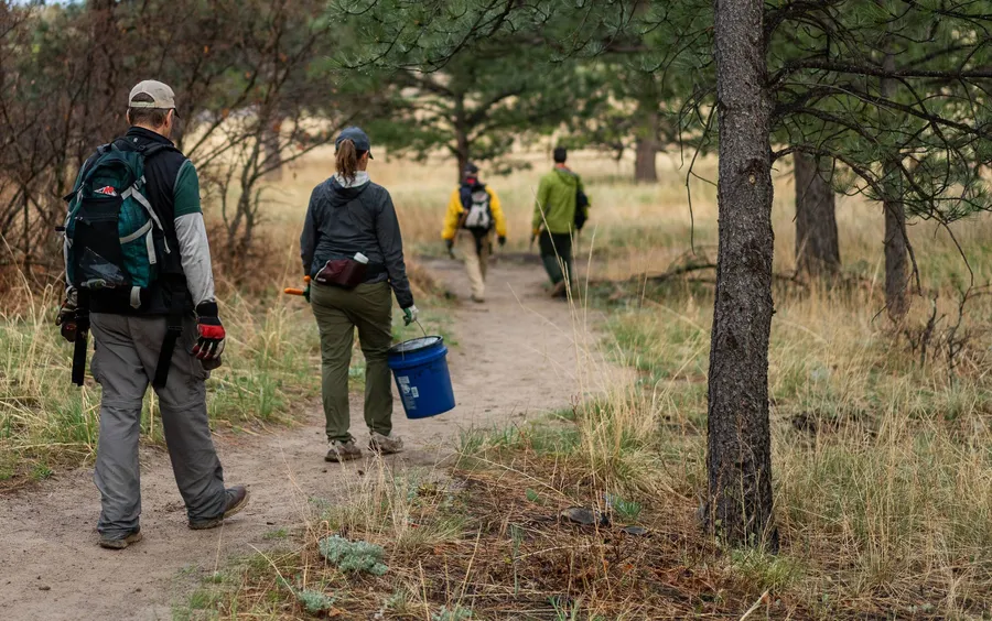 Volunteers working on a fence